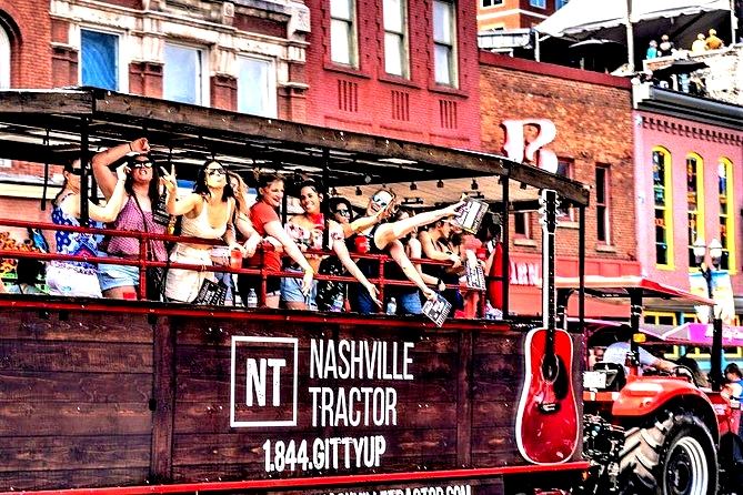 Group of women riding on the Nashville Tractor wagon through downtown.